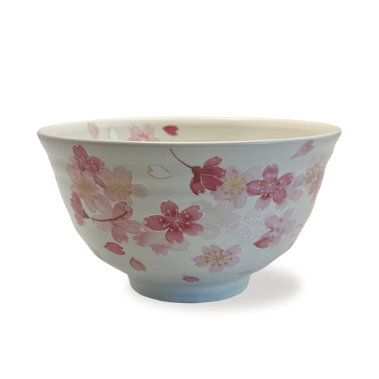 Ceramic bowl with cherry blossom design on a white  background