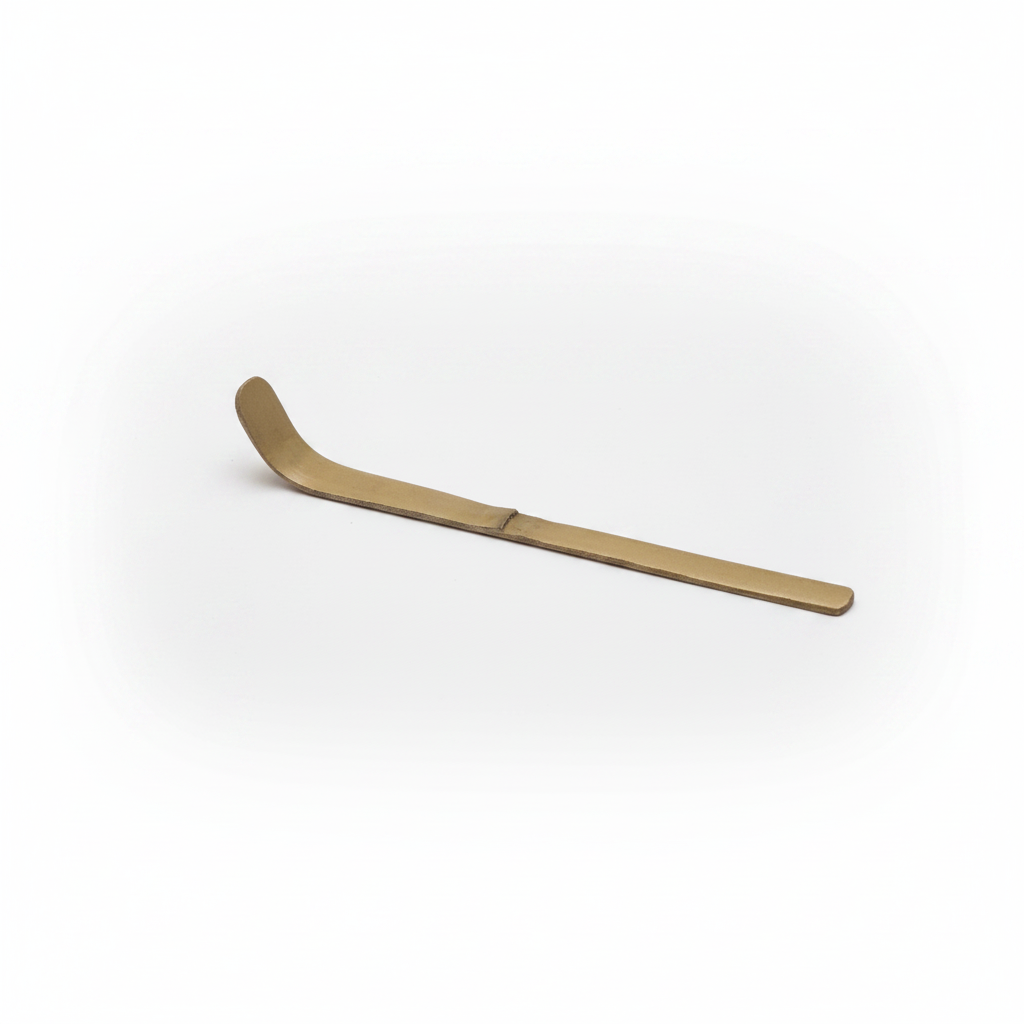 wooden matcha scoop on a white background